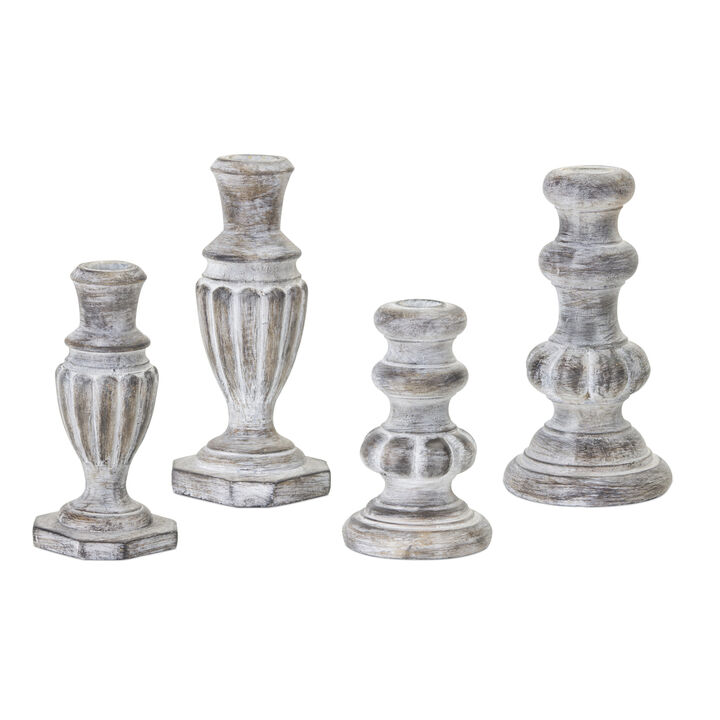 HomeRoots Set of Four White Washed Resin Tabletop Candle Sticks