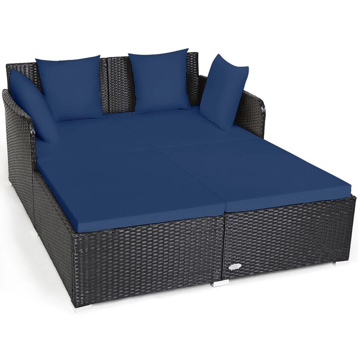 Mondawe Spacious Outdoor Rattan Daybed with Upholstered Cushions and Pillows