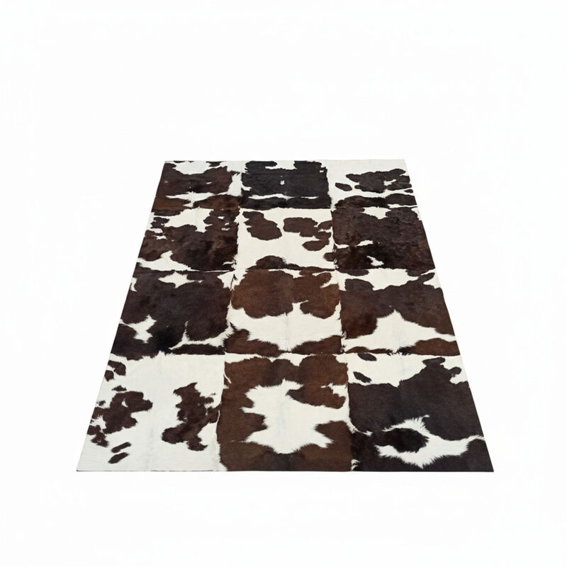 Brown and White Patchwork Cowhide Rug image number 0