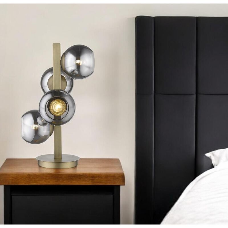 Hivvago 24" Brass Metal Four Light Novelty Table Lamp With Silver Metallic Globe Shades