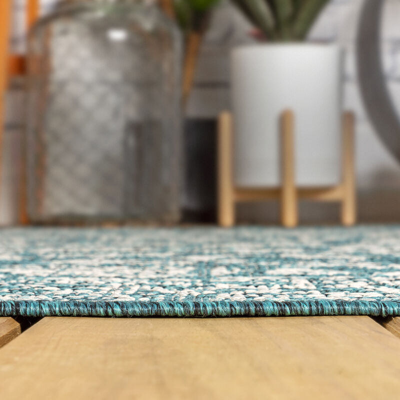 Tela Bohemian Textured Weave Floral Area Rug
