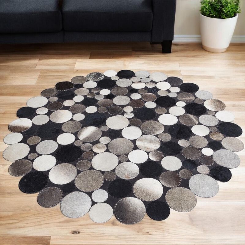 Black & Gray Cowhide Patchwork Round Rug image number 1