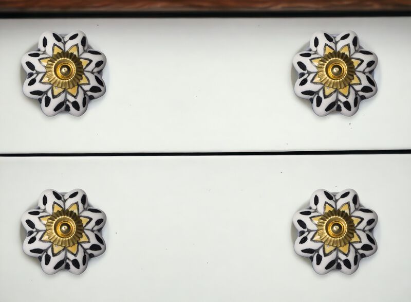 HomeRoots Set of Eight Black And Yellow Ceramic And Metal Drawer Pull Knobs image number 1