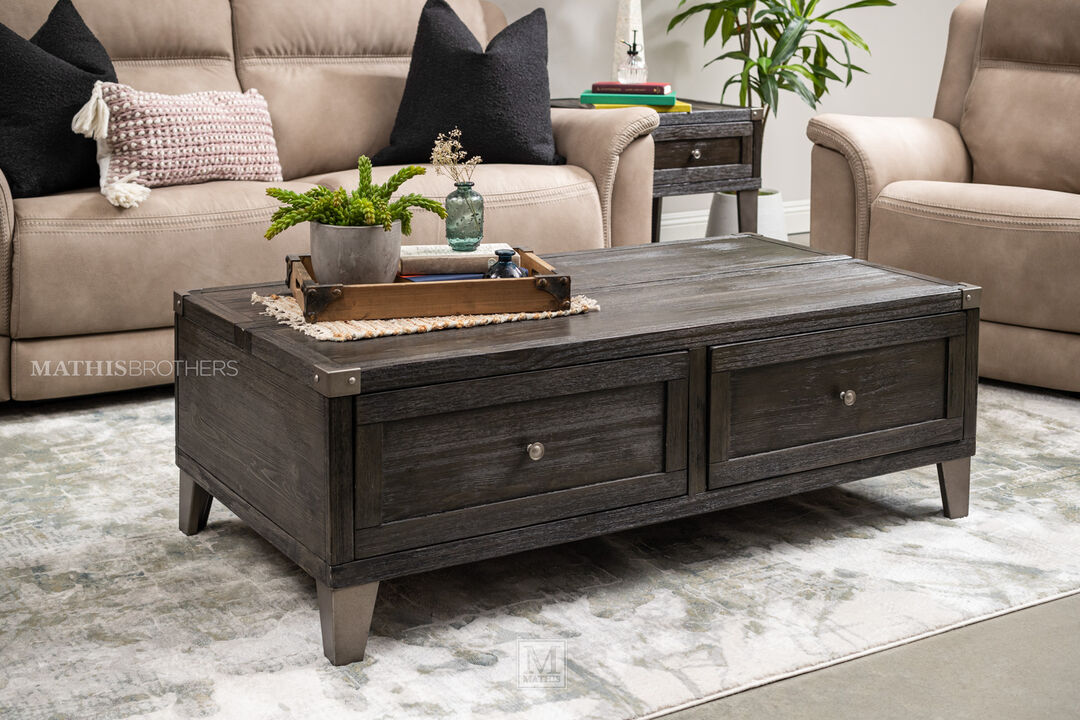 Ashley Todoe Coffee Table with Lift Top in a living room setting in front of a tan sofa.