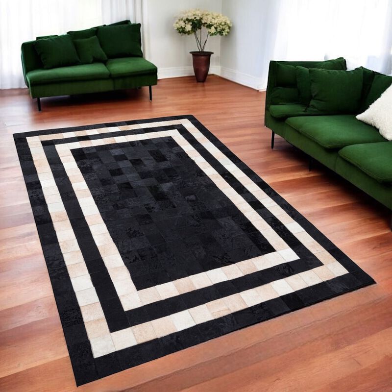 Cream Cowhide Patchwork Rug with Black Frame image number 2