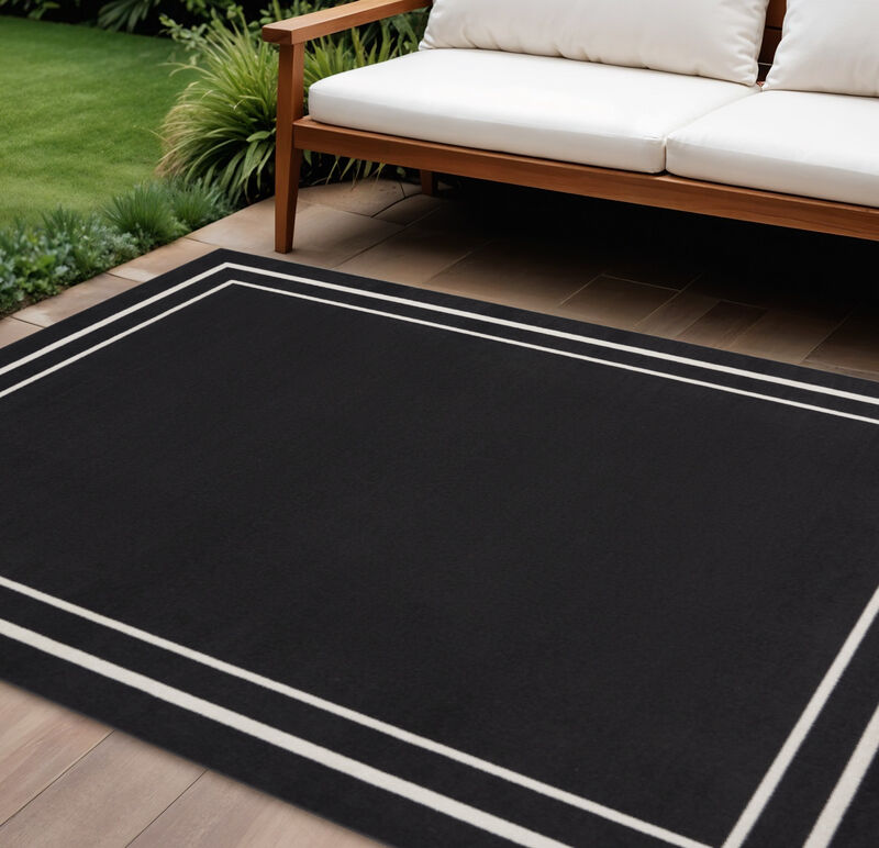 HomeRoots 10' X 14' Black And Ivory Indoor Outdoor Area Rug image number 1