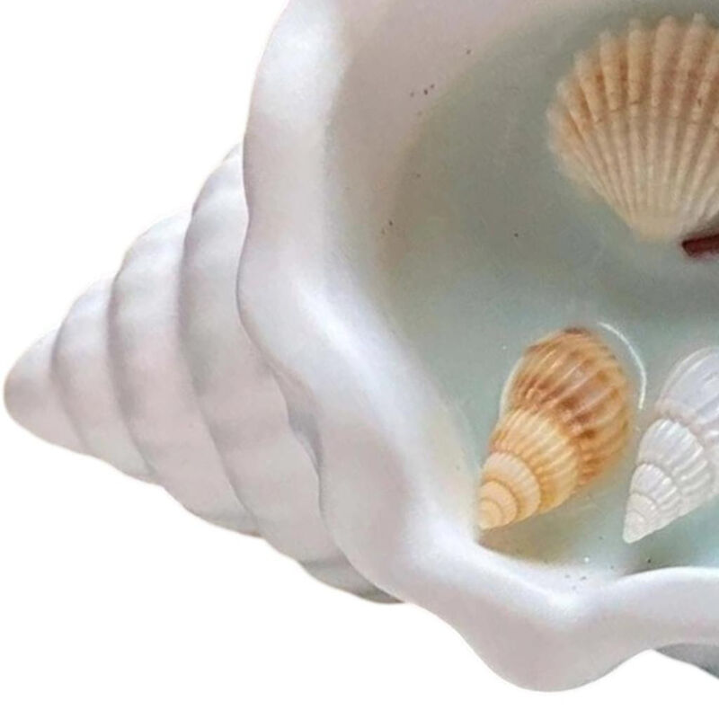 HomeRoots 6" Unscented Soy Wax Candle In White Resin Novelty Holder With Seashells image number 2