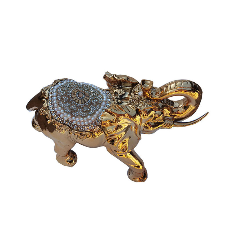 Delightfully Extravagant Gold Plated Elephant with Embedded Crystal and Pearl Saddle (11.5"L x 5"W x 8.5"H)