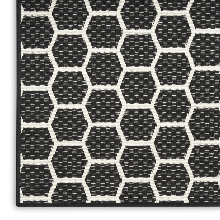 HomeRoots 10' Black And Ivory Geometric Indoor Outdoor Runner Rug