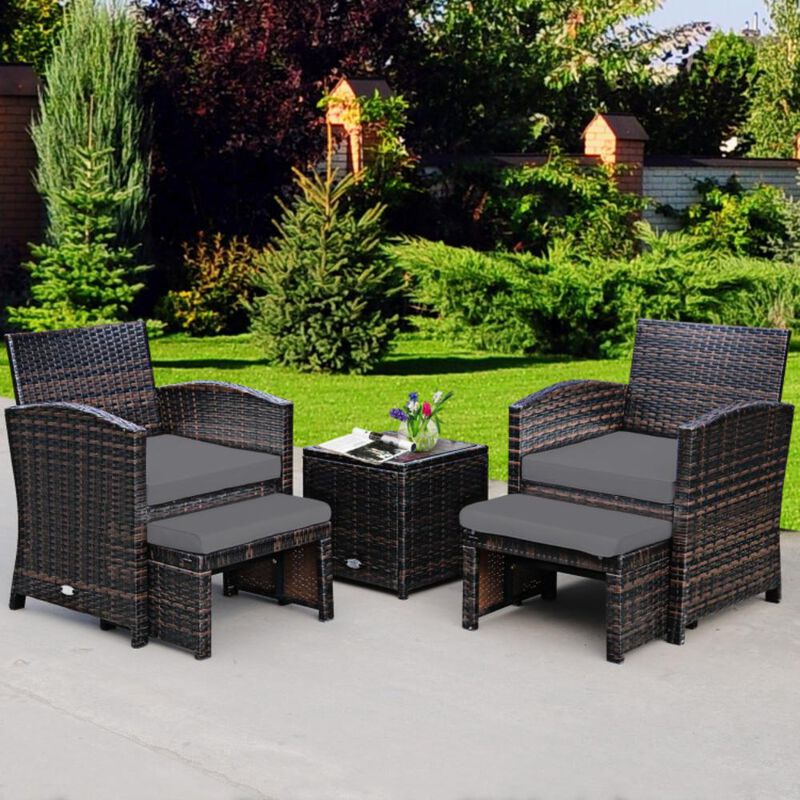 Hivvago 5 Pieces Patio Rattan Furniture Set with Ottoman and Tempered Glass Coffee Table