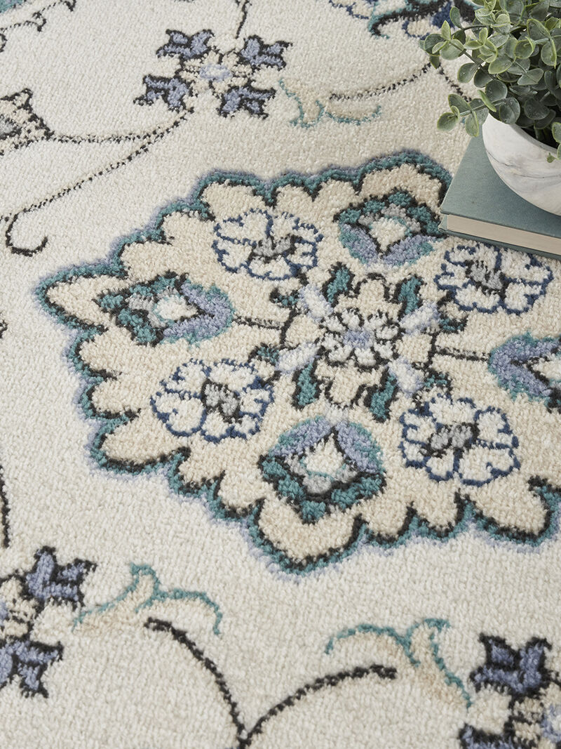 Nourison Essentials NRE05 Ivory/Blue 5' x 7' Rug