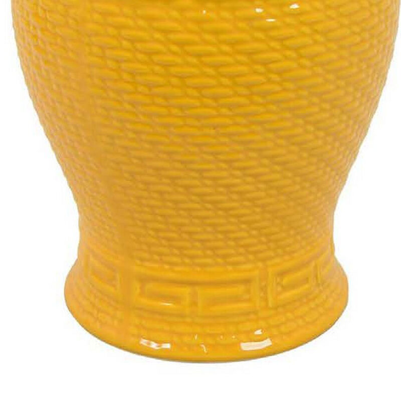Bryan 18 Inch Ceramic Temple Jar, Geometric Print, Finial Top, Yellow - Benzara