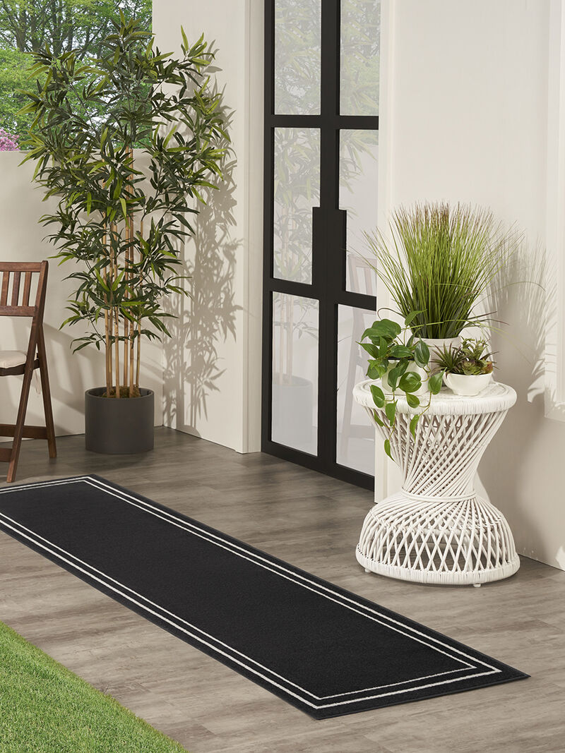 Nourison Essentials NRE02 Black/Ivory 2'2" x 7'6" Rug image number 1