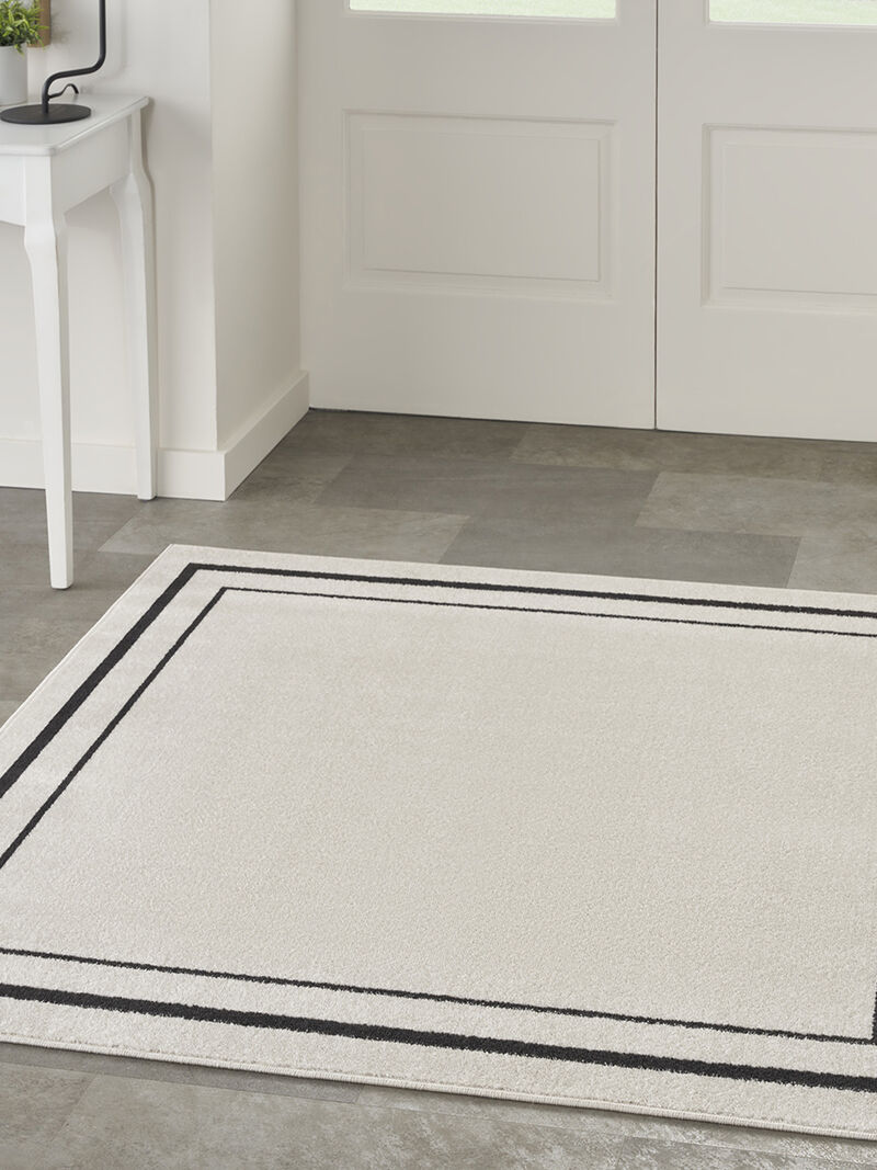 Nourison Essentials NRE02 Ivory/Black 5' x Square Rug