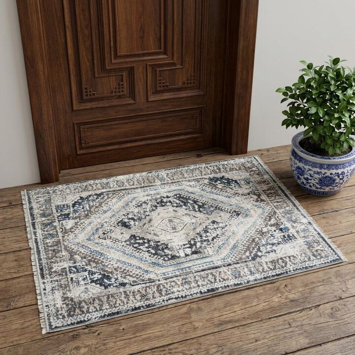 HomeRoots Geometric Distressed Area Rug With Fringe