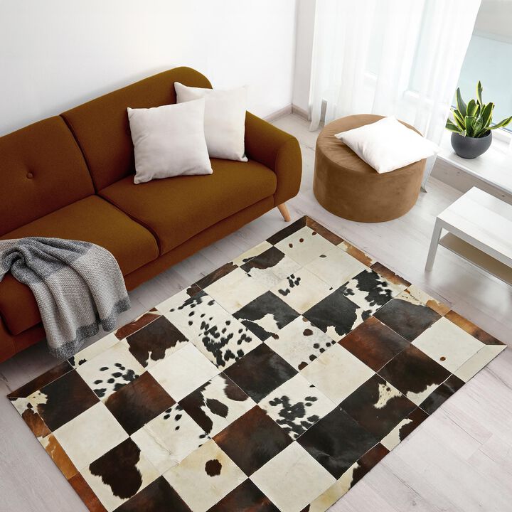Brown and White Cowhide Patchwork Rug