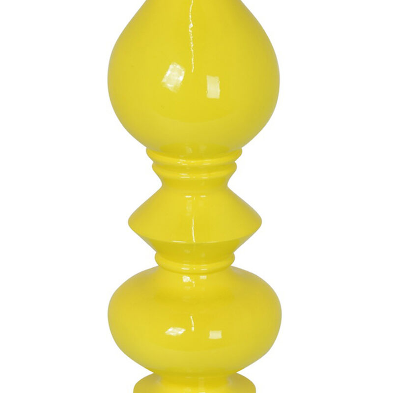 Naze Tabletop Candle Holder with Turned Accents, 23 Inch Yellow Resin - Benzara