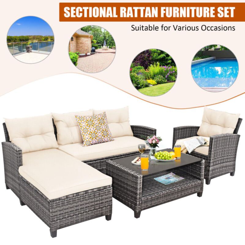 Hivvago 4 Pieces Patio Rattan Furniture Set with Cushion and Table Shelf