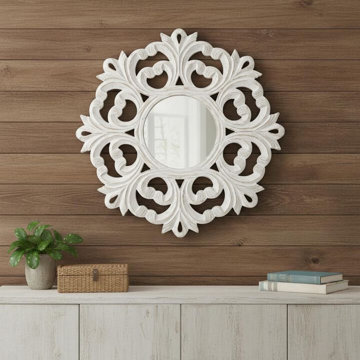 HomeRoots 24" White Floral Scrollwork Distressed Round Framed Accent Mirror