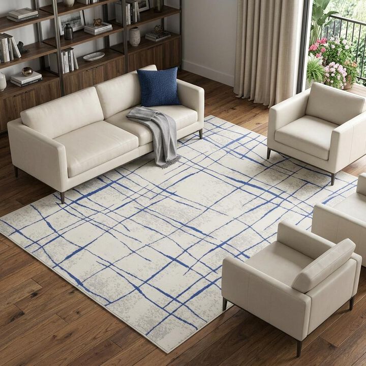 HomeRoots 6' X 9' Ivory And Blue Geometric Distressed Area Rug