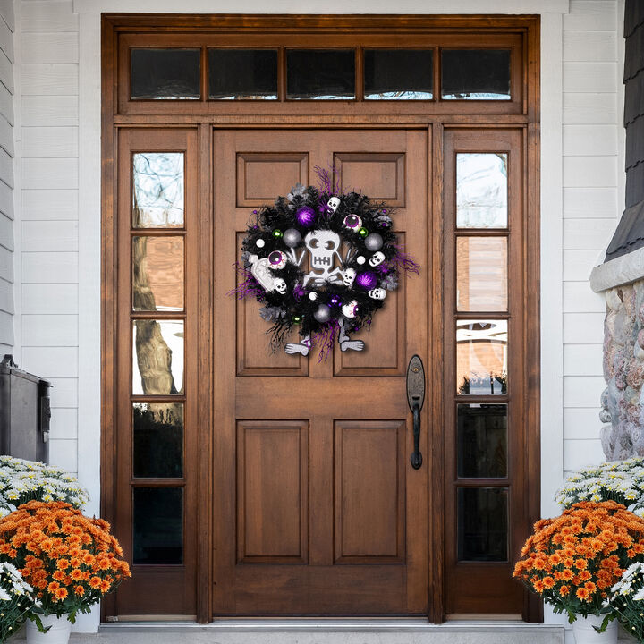 Purple and Black Spooky Skeleton Pine Halloween Wreath  24-Inch  Unlit
