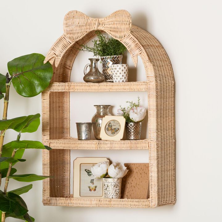 bali & pari Creusa Natural Rattan Wall Shelf - 3-Tier Decorative Storage Rack with Arched Frame and Woven Bow Accent, Boho Coastal Display Shelf