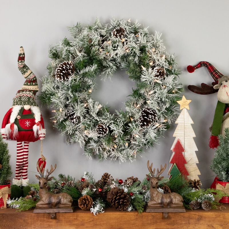 Pre-lit Heavily Flocked Madison Pine Artificial Christmas Wreath  24-Inch  Clear Lights