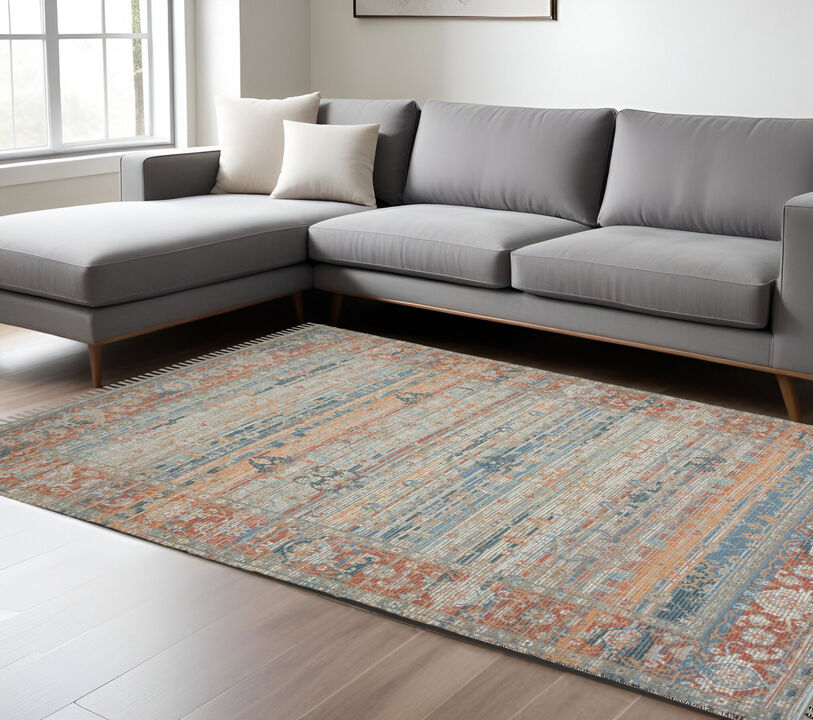 HomeRoots 8' X 10' Blue Brick Red And Ivory Oriental Hand Woven Area Rug With Fringe