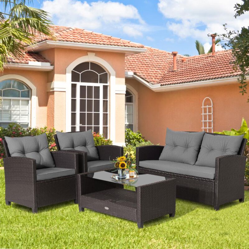 Hivvago 4 Pieces Patio Rattan Conversation Furniture Set with Glass Top Coffee Table