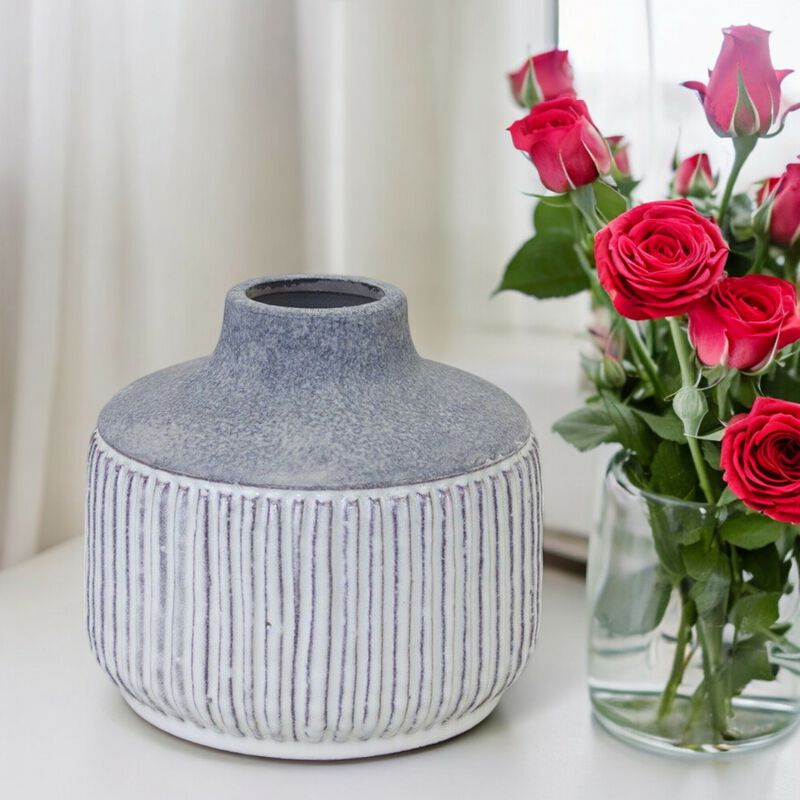 Vase – Stylish Decorative Container for Flowers and Home Decor Accents