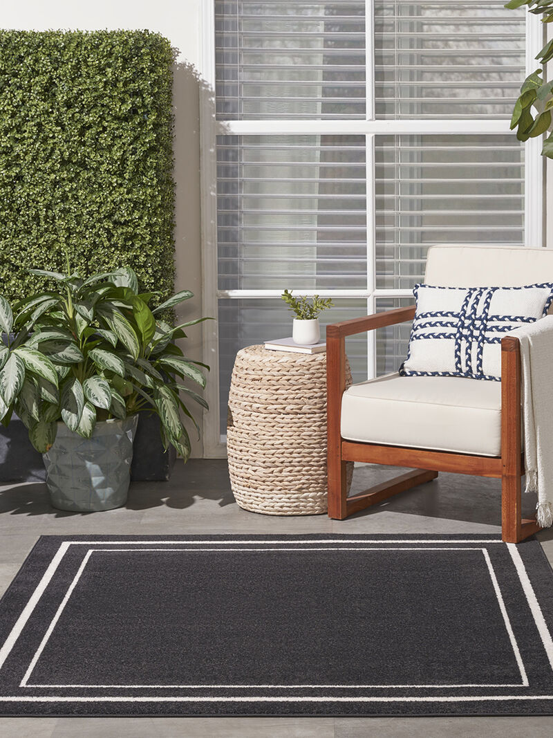 Nourison Essentials NRE02 Black/Ivory 5' x Square Rug image number 1