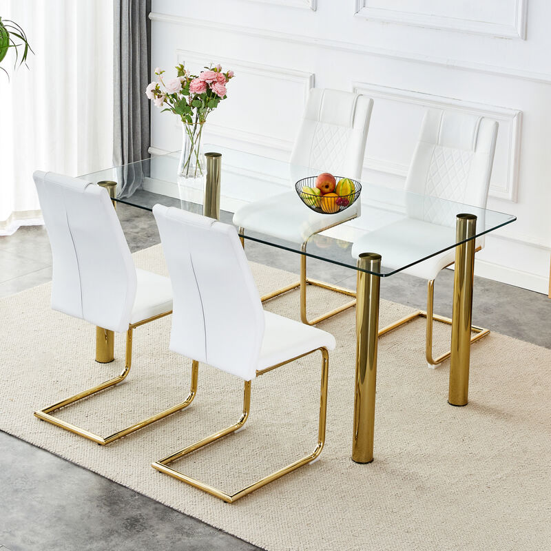1 table with 6 chairs, transparent tempered glass tabletop, thickness 0.3 feet, golden metal legs, paired with white PU backrest cushion chair, golden plated metal legs.T003 C001
