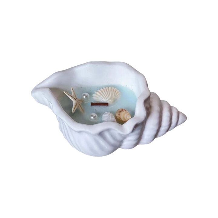 HomeRoots 6" Unscented Soy Wax Candle In White Resin Novelty Holder With Seashells