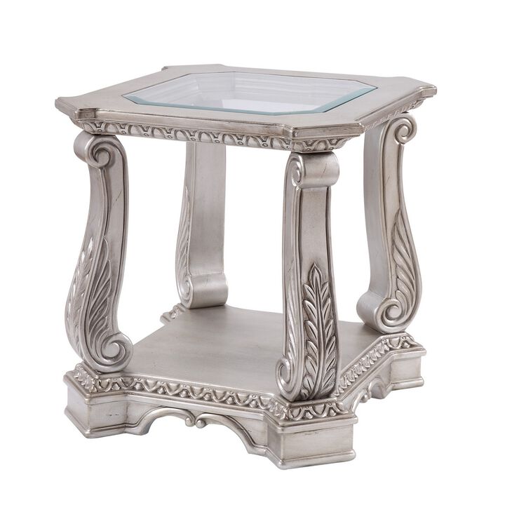 Antique Wooden End Table with Polyresin Engravings and Glass Top, Silver and Clear-Benzara
