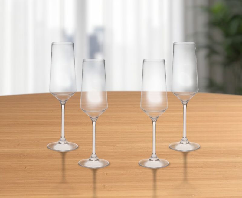 HomeRoots Set of Four Clear Tritan Plastic Stemmed Flutes image number 1