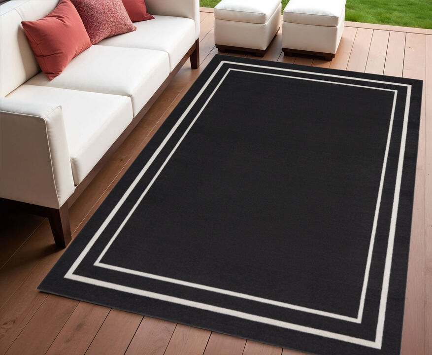HomeRoots 4' X 6' Black And Ivory Indoor Outdoor Area Rug