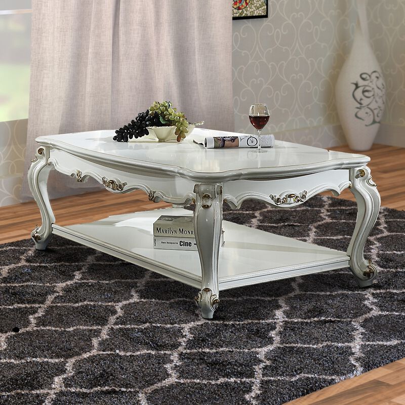 Traditional Style Wooden Coffee Table with Polyresin Carvings and Bottom Shelf, White-Benzara