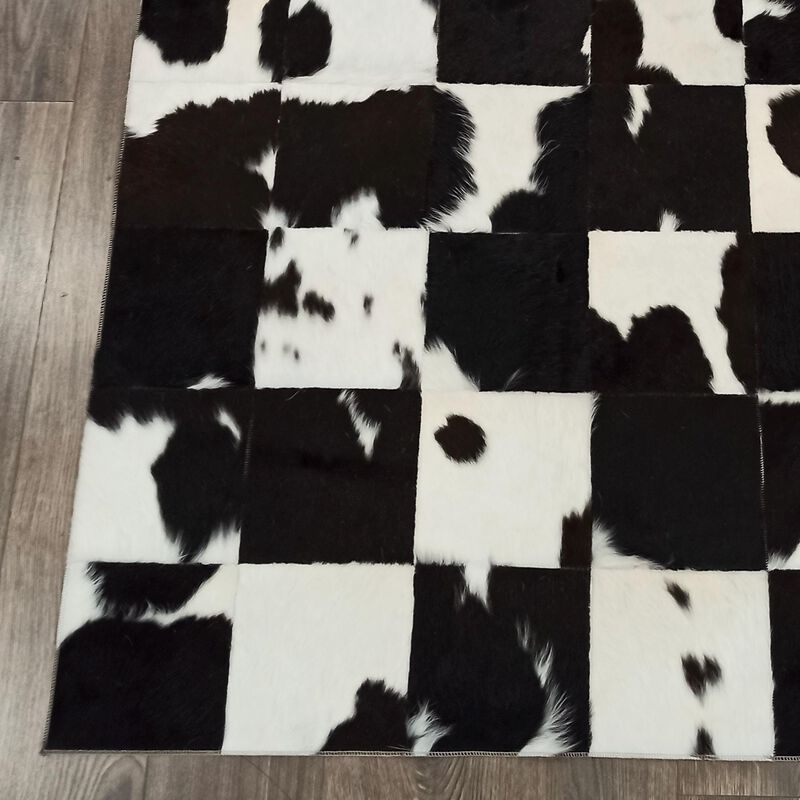 Black White Cowhide Patchwork Rug image number 2