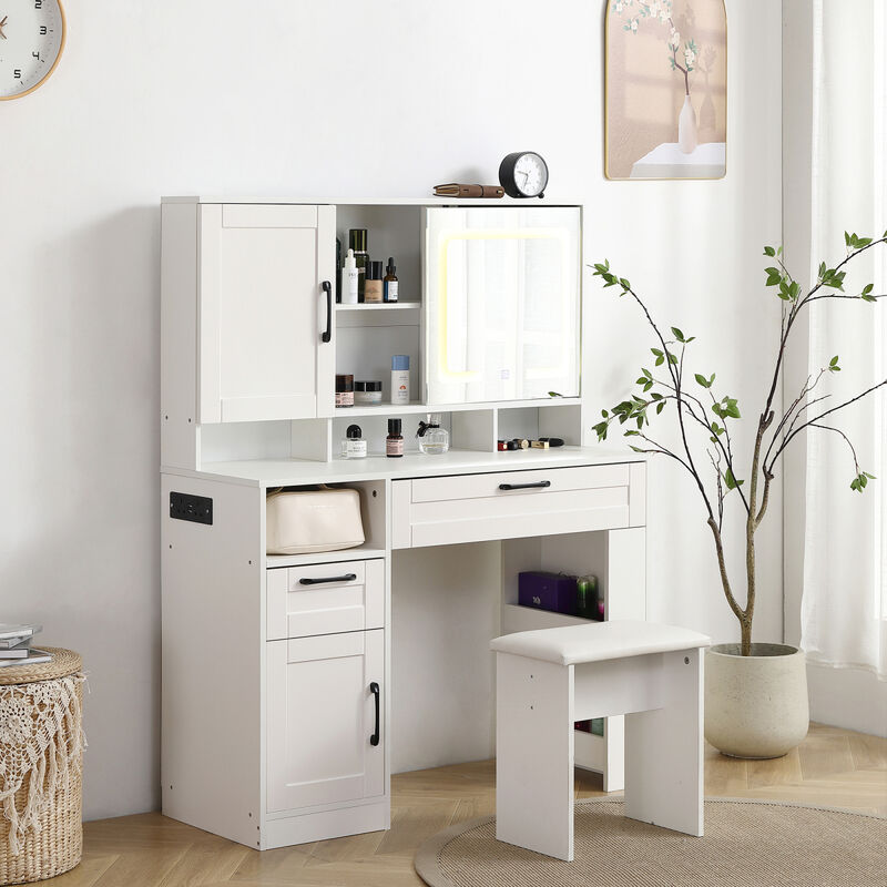 Vanity table with large sliding lighted mirror, dressing table with 2 drawers, storage shelves and upholstered stool, white color