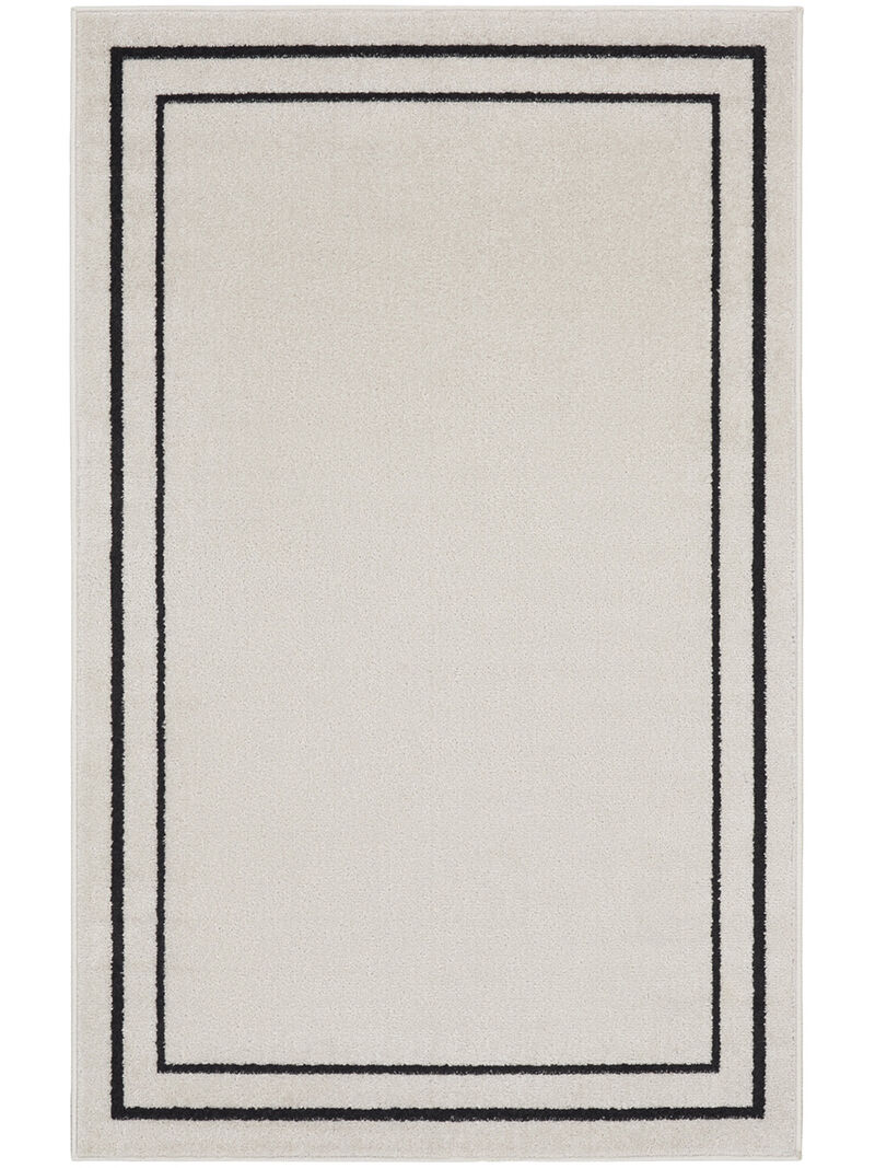 Nourison Essentials NRE02 Ivory/Black 2'2" x 7'6" Rug image number 0
