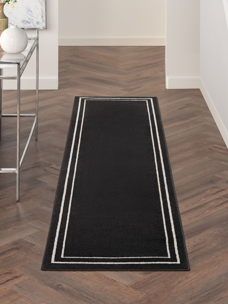 Nourison Essentials NRE02 Black/Ivory 2'2" x 7'6" Rug image number 2