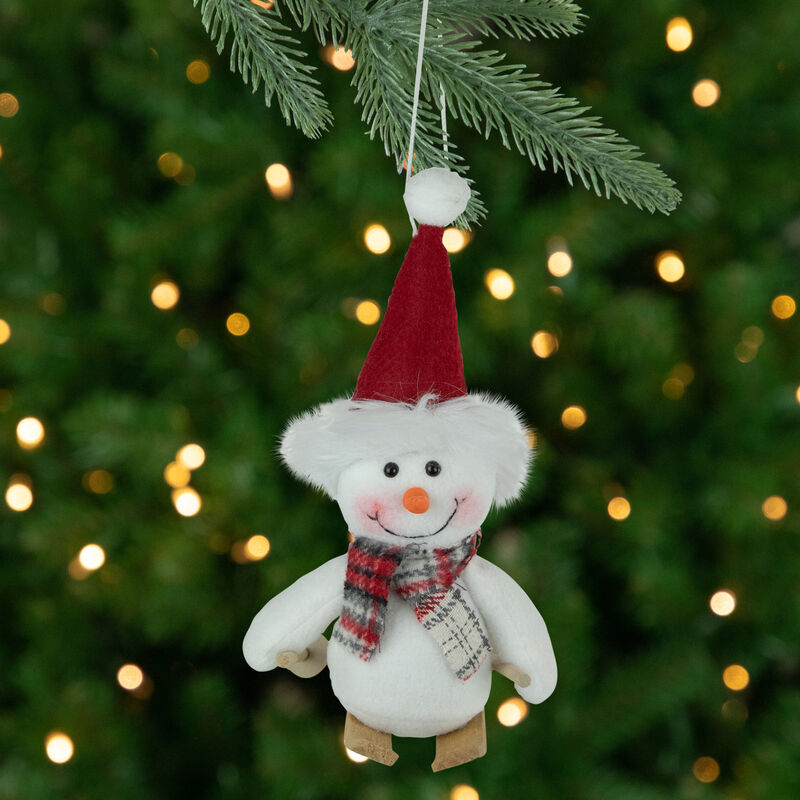 9.5" Skiing Snowman with Red Santa Hat Christmas Ornament image number 1