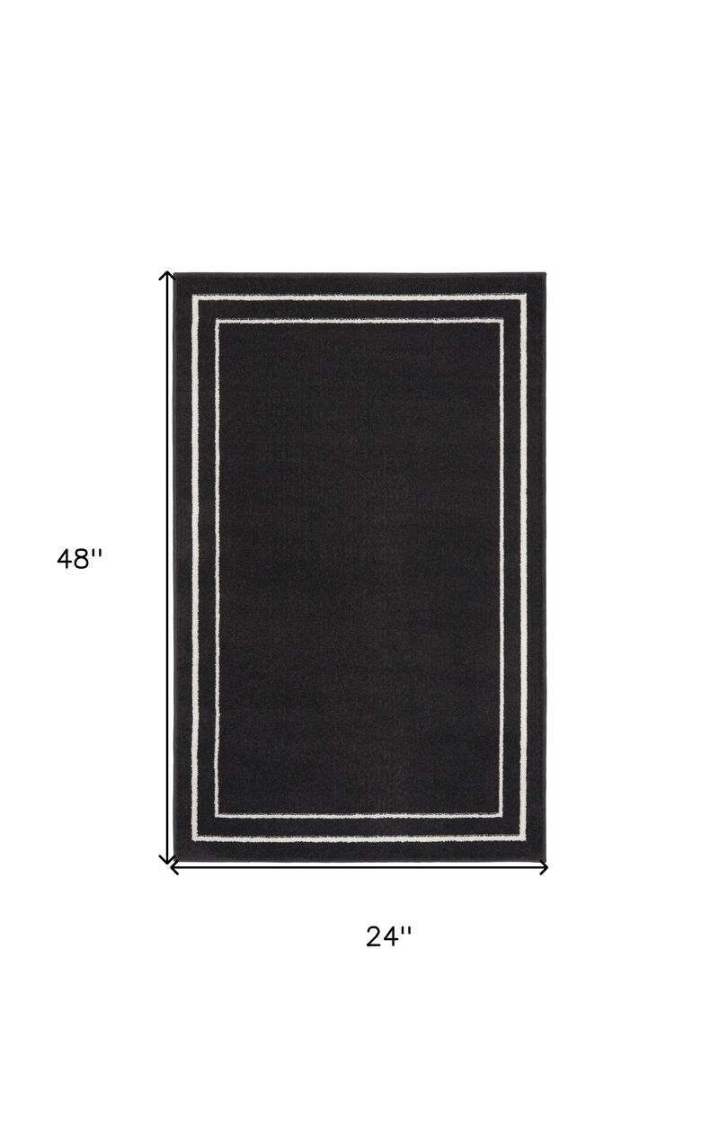 HomeRoots 2' X 4' Black And Ivory Indoor Outdoor Area Rug image number 5