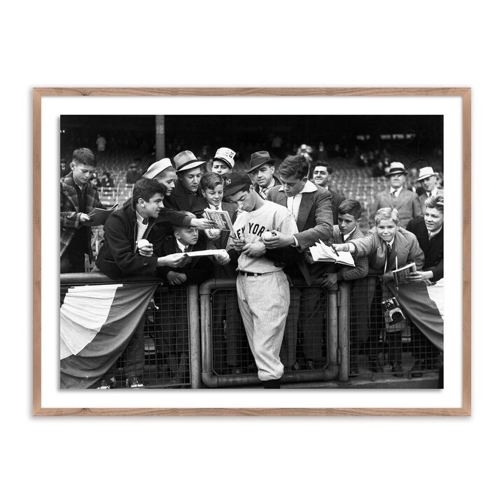 Joe DiMaggio Signing Autographs by Getty Images