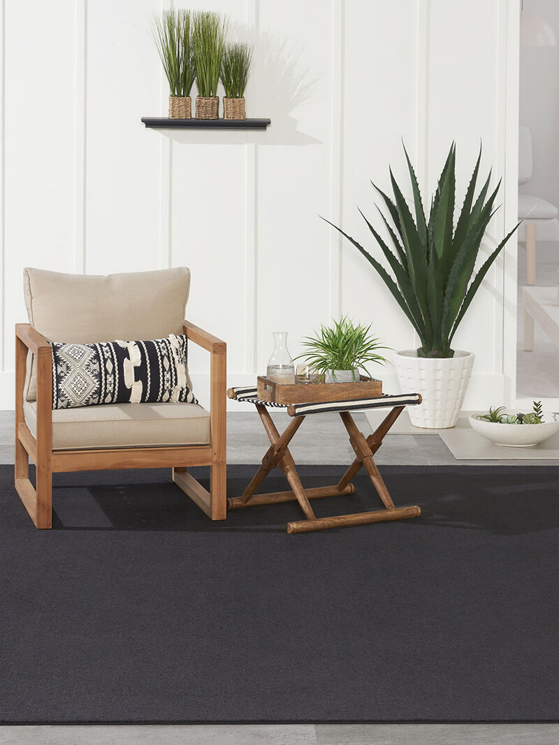 Nourison Essentials NRE01 Black 7' x 10' Rug image number 1