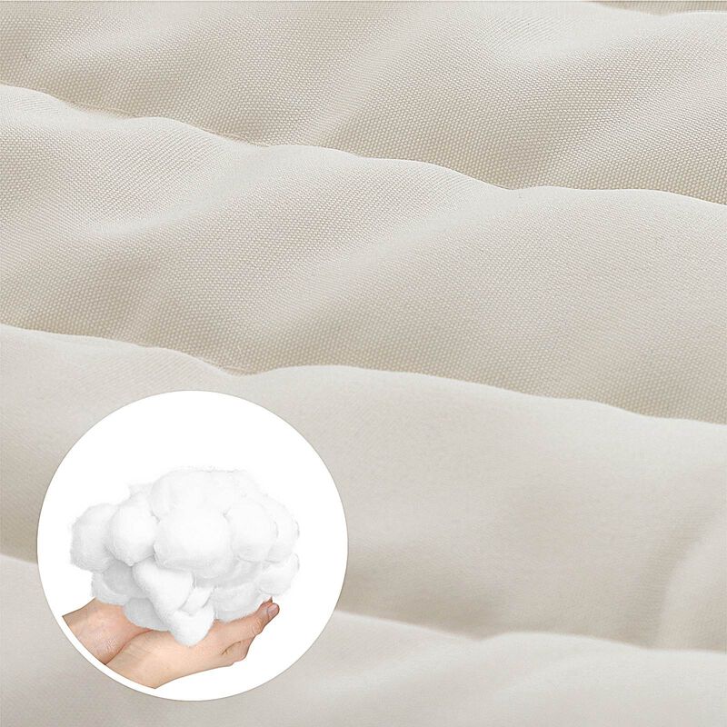 Quilted Hammock with Curved Wicker Spreaders for Comfortable Outdoor Relaxation