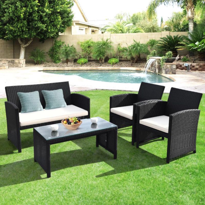 Hivvago 4 Pieces Rattan Patio Furniture Set with Weather Resistant Cushions and Tempered Glass Tabletop