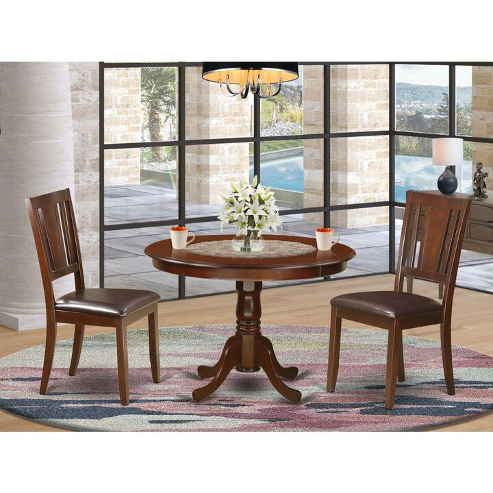 3 Pc set with a Round Kitchen Table and 2 Leather Dinette Chairs in Mahogany