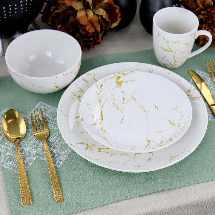 Elama Fine Marble 16 Piece Stoneware Dinnerware Set in Gold and White