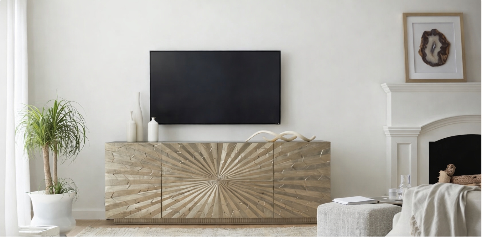 Wide media console under a wall-mounted TV in a living room
